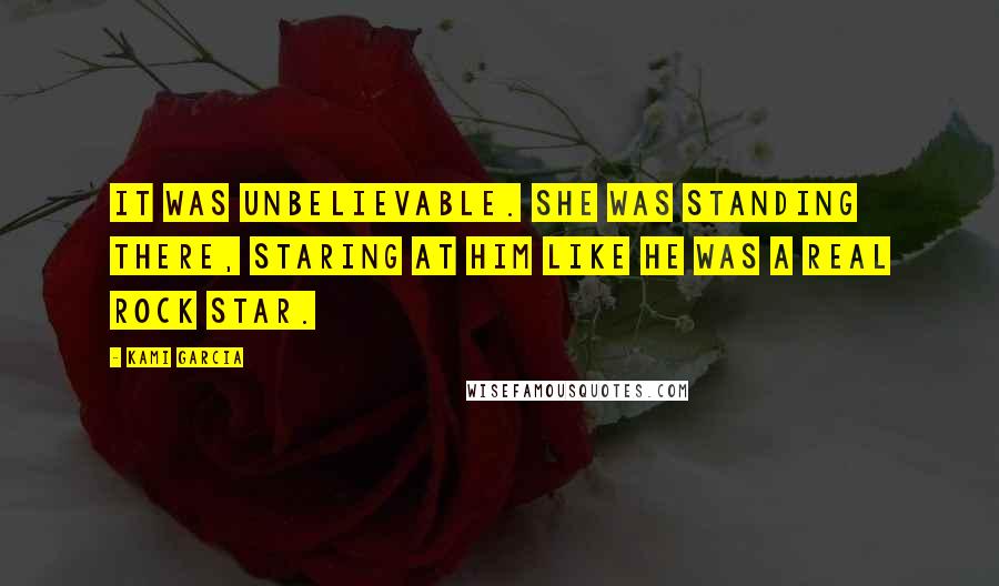 Kami Garcia Quotes: It was unbelievable. She was standing there, staring at him like he was a real rock star.