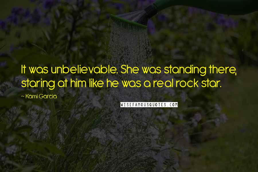 Kami Garcia Quotes: It was unbelievable. She was standing there, staring at him like he was a real rock star.