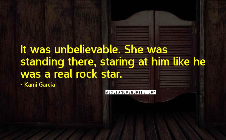 Kami Garcia Quotes: It was unbelievable. She was standing there, staring at him like he was a real rock star.