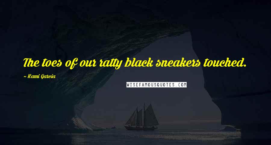 Kami Garcia Quotes: The toes of our ratty black sneakers touched.