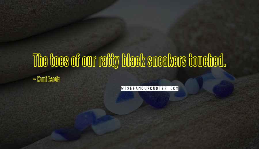 Kami Garcia Quotes: The toes of our ratty black sneakers touched.