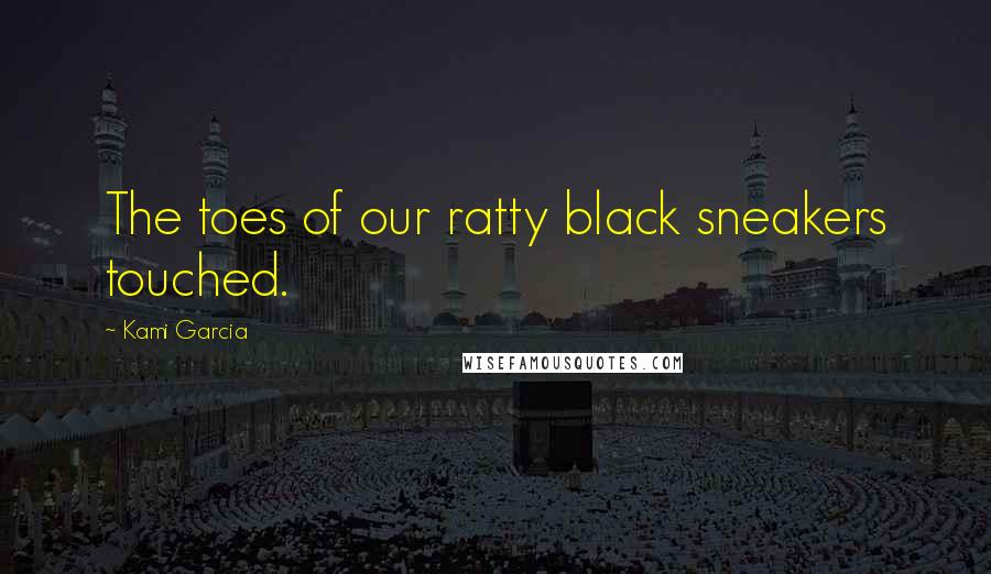 Kami Garcia Quotes: The toes of our ratty black sneakers touched.