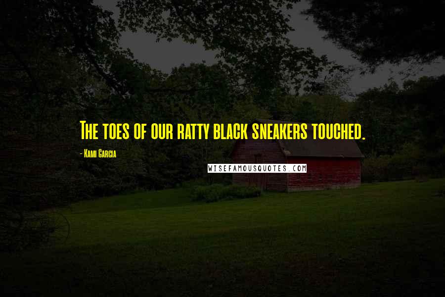 Kami Garcia Quotes: The toes of our ratty black sneakers touched.