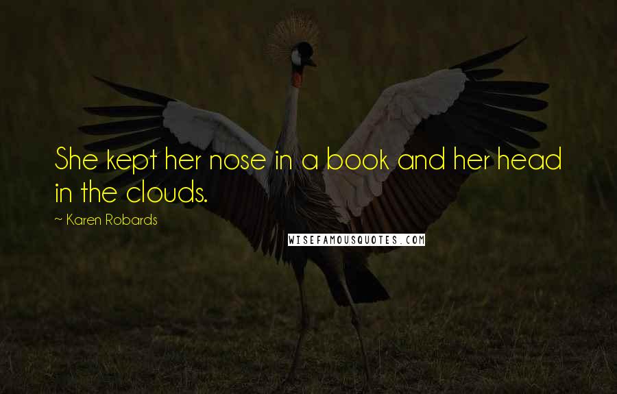 Karen Robards Quotes: She kept her nose in a book and her head in the clouds.