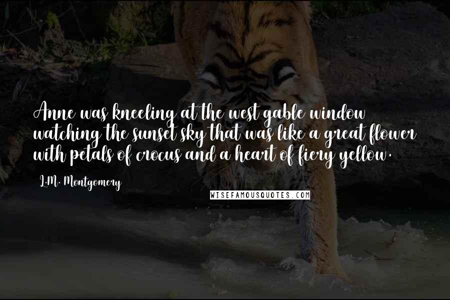 L.M. Montgomery Quotes: Anne was kneeling at the west gable window watching the sunset sky that was like a great flower with petals of crocus and a heart of fiery yellow.