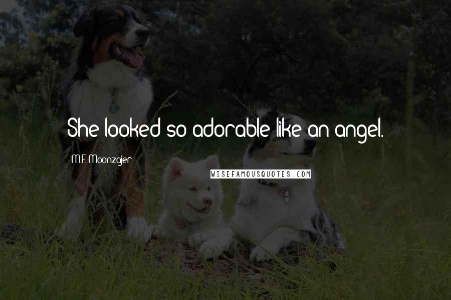 M.F. Moonzajer Quotes: She looked so adorable like an angel.