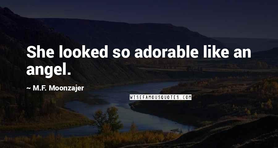 M.F. Moonzajer Quotes: She looked so adorable like an angel.