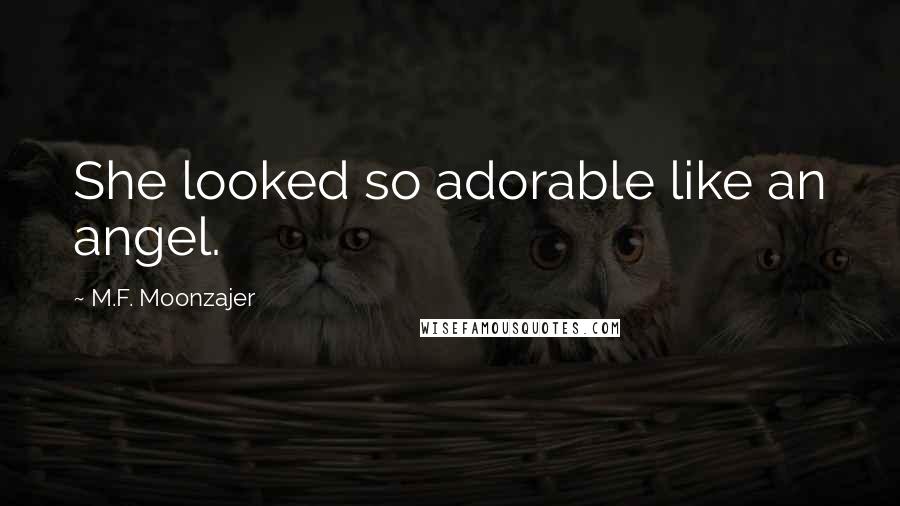M.F. Moonzajer Quotes: She looked so adorable like an angel.