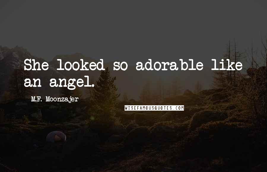 M.F. Moonzajer Quotes: She looked so adorable like an angel.