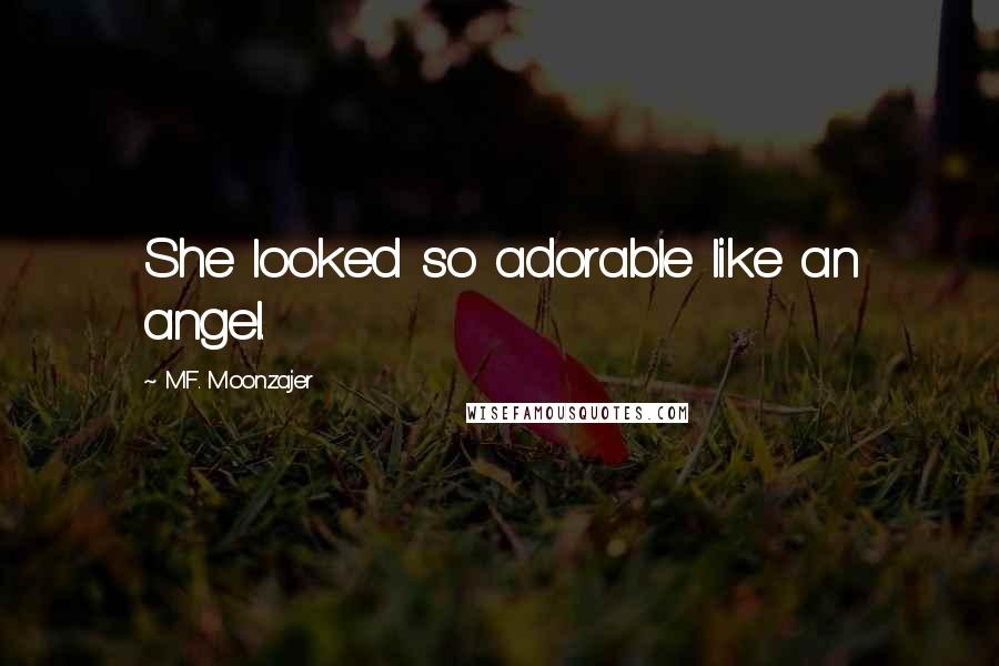 M.F. Moonzajer Quotes: She looked so adorable like an angel.