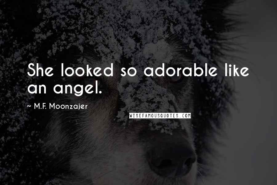 M.F. Moonzajer Quotes: She looked so adorable like an angel.