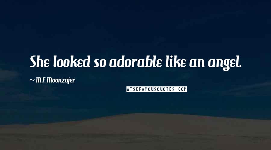 M.F. Moonzajer Quotes: She looked so adorable like an angel.