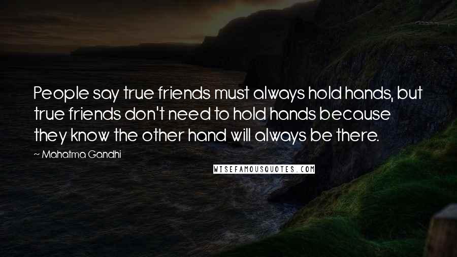 Mahatma Gandhi Quotes: People say true friends must always hold hands, but true friends don't need to hold hands because they know the other hand will always be there.