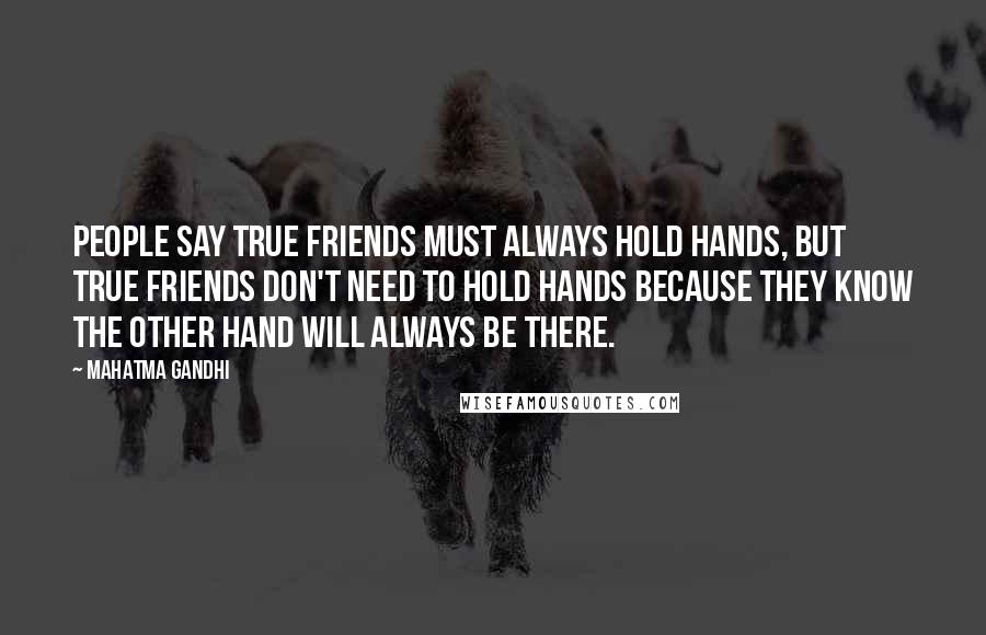 Mahatma Gandhi Quotes: People say true friends must always hold hands, but true friends don't need to hold hands because they know the other hand will always be there.
