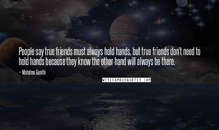 Mahatma Gandhi Quotes: People say true friends must always hold hands, but true friends don't need to hold hands because they know the other hand will always be there.