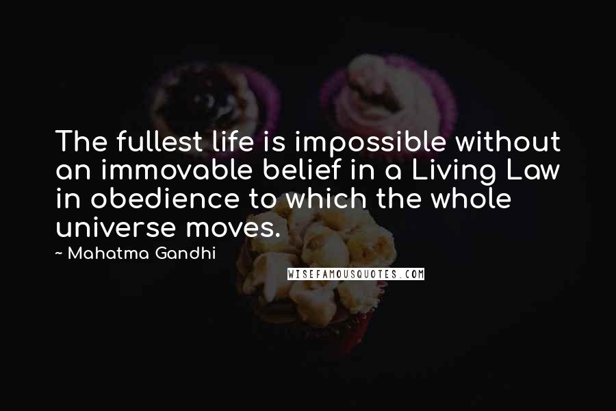 Mahatma Gandhi Quotes: The fullest life is impossible without an immovable belief in a Living Law in obedience to which the whole universe moves.