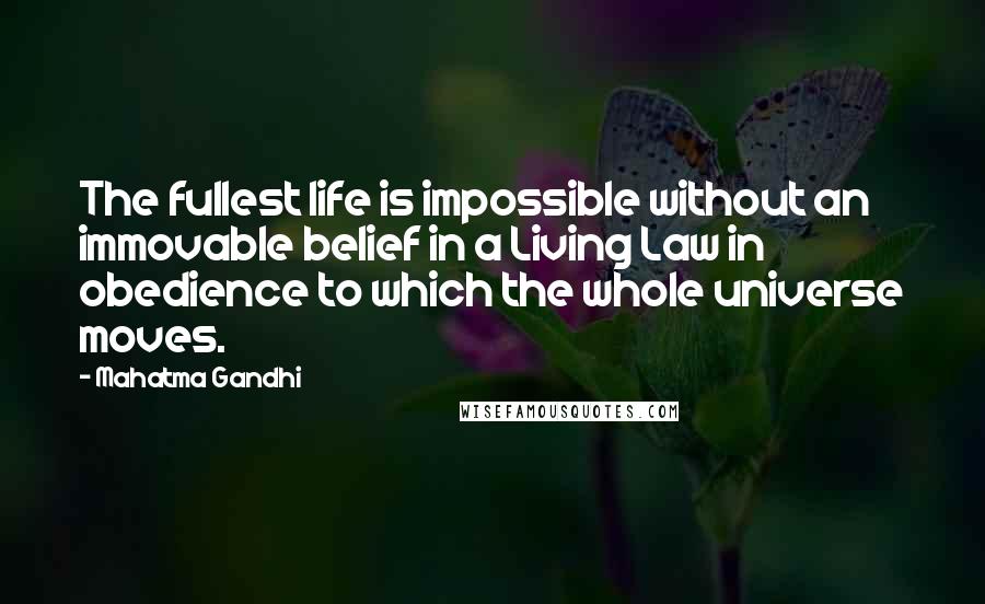 Mahatma Gandhi Quotes: The fullest life is impossible without an immovable belief in a Living Law in obedience to which the whole universe moves.