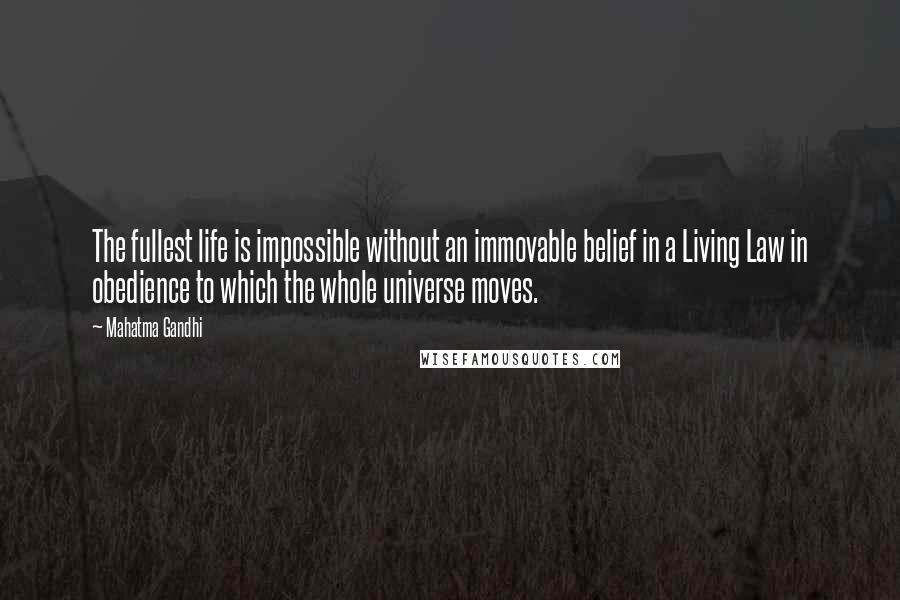 Mahatma Gandhi Quotes: The fullest life is impossible without an immovable belief in a Living Law in obedience to which the whole universe moves.