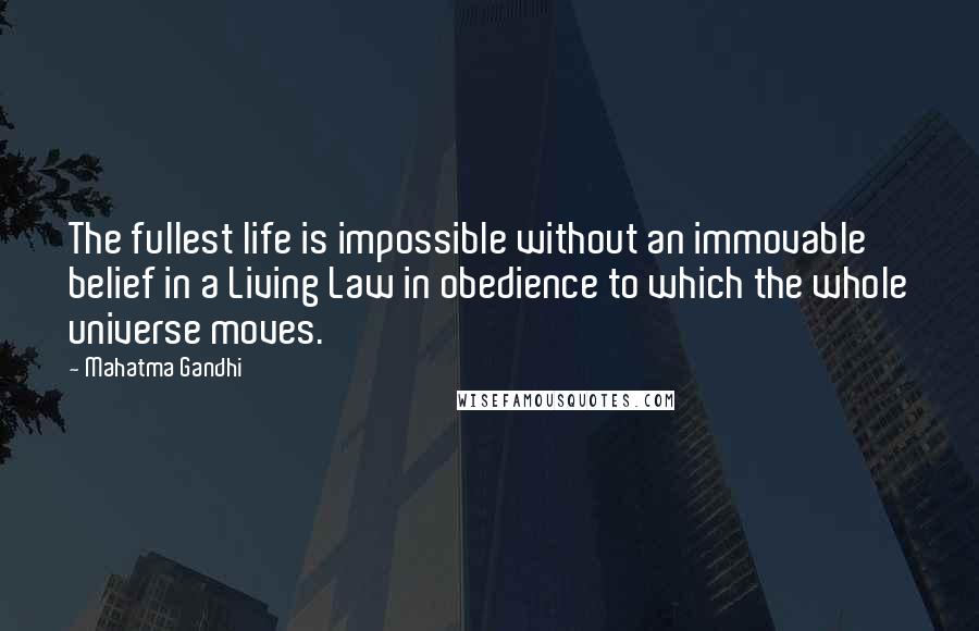 Mahatma Gandhi Quotes: The fullest life is impossible without an immovable belief in a Living Law in obedience to which the whole universe moves.