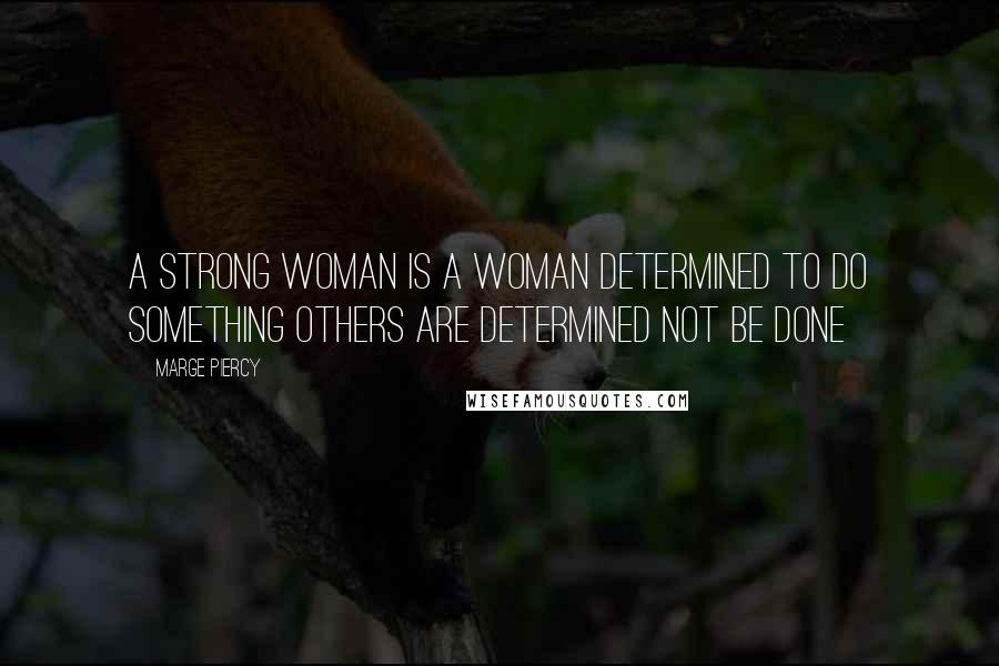 Marge Piercy Quotes: A strong woman is a woman determined to do something others are determined not be done