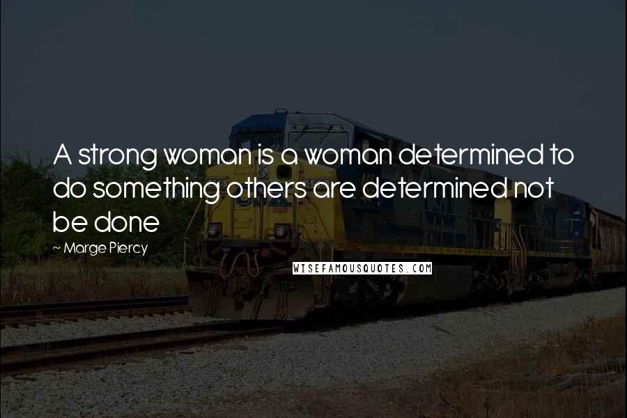 Marge Piercy Quotes: A strong woman is a woman determined to do something others are determined not be done