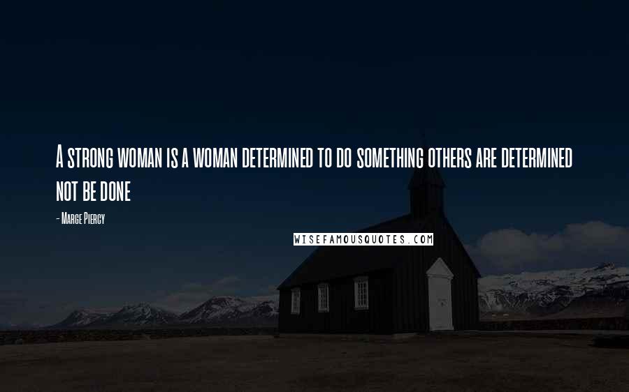 Marge Piercy Quotes: A strong woman is a woman determined to do something others are determined not be done