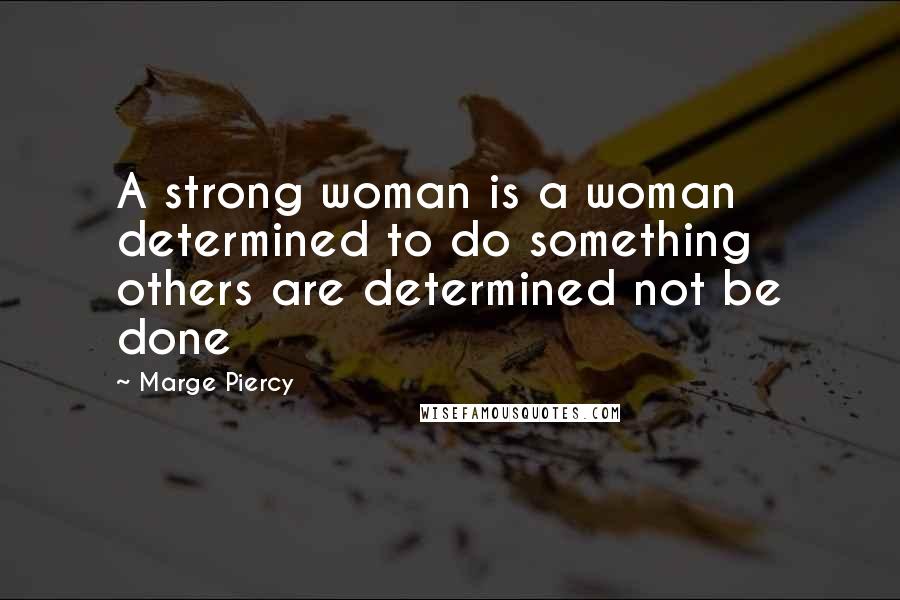 Marge Piercy Quotes: A strong woman is a woman determined to do something others are determined not be done