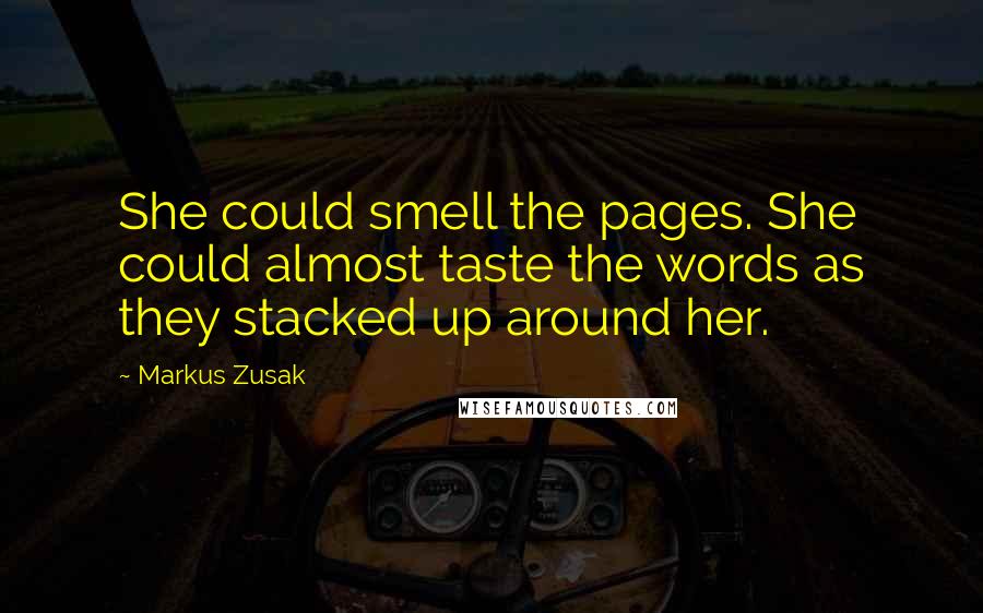 Markus Zusak Quotes: She could smell the pages. She could almost taste the words as they stacked up around her.