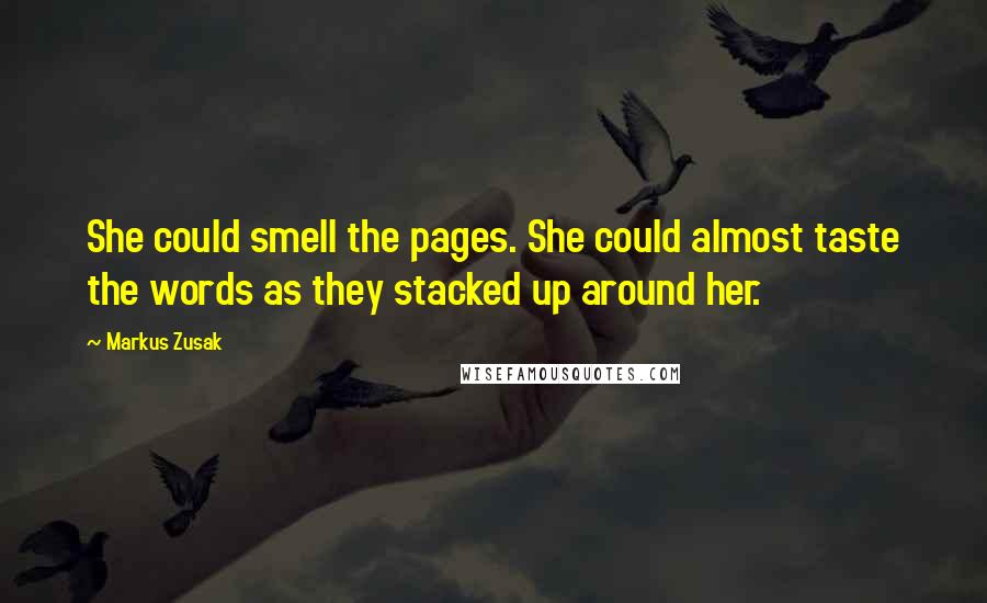 Markus Zusak Quotes: She could smell the pages. She could almost taste the words as they stacked up around her.