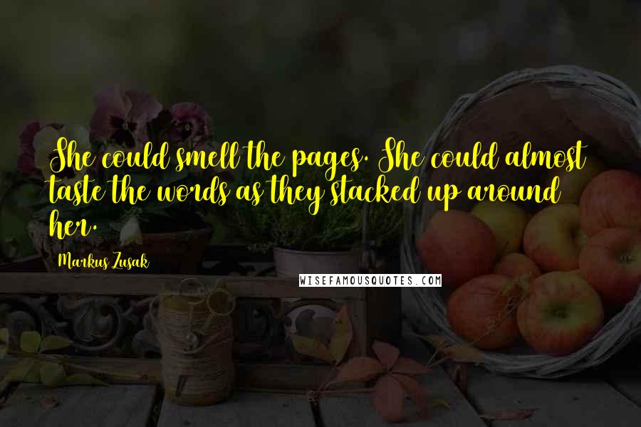 Markus Zusak Quotes: She could smell the pages. She could almost taste the words as they stacked up around her.