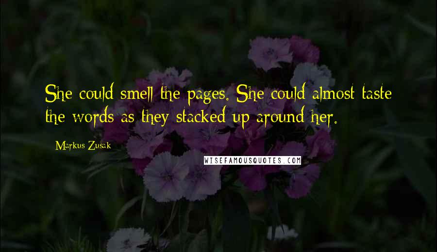 Markus Zusak Quotes: She could smell the pages. She could almost taste the words as they stacked up around her.