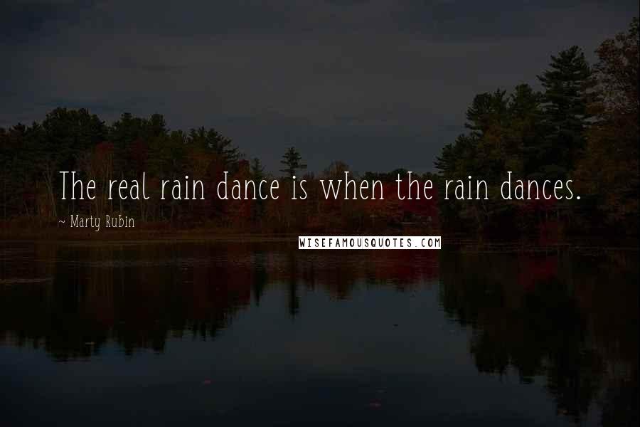 Marty Rubin Quotes: The real rain dance is when the rain dances.