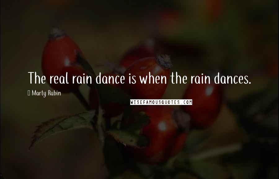 Marty Rubin Quotes: The real rain dance is when the rain dances.