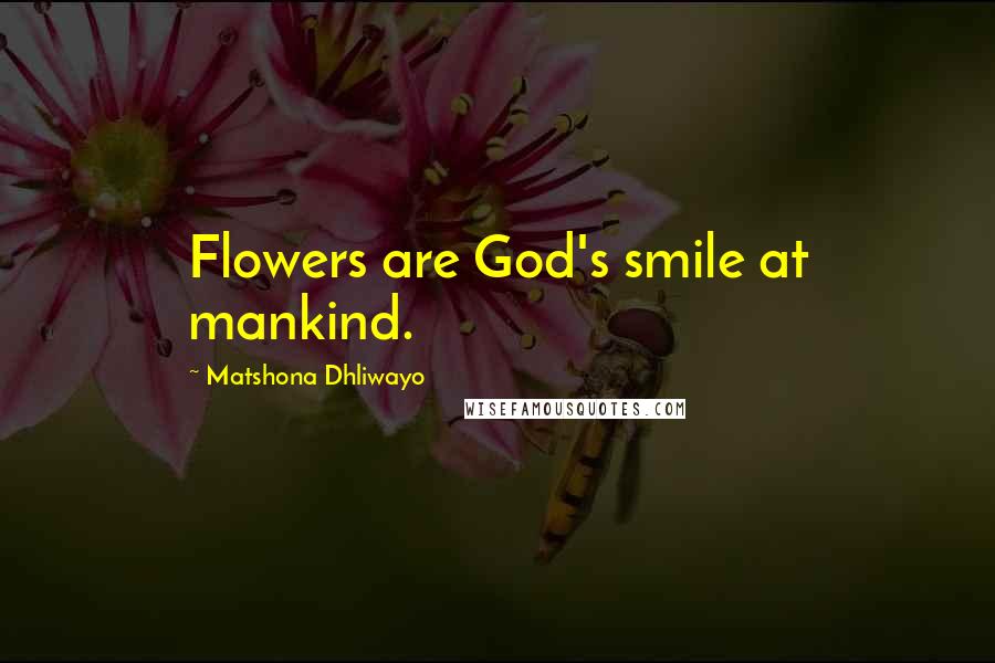 Matshona Dhliwayo Quotes: Flowers are God's smile at mankind.