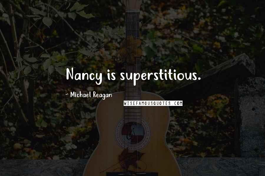 Michael Reagan Quotes: Nancy is superstitious.