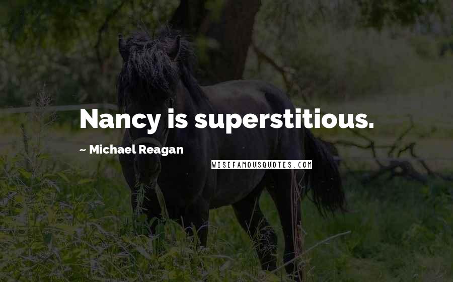 Michael Reagan Quotes: Nancy is superstitious.