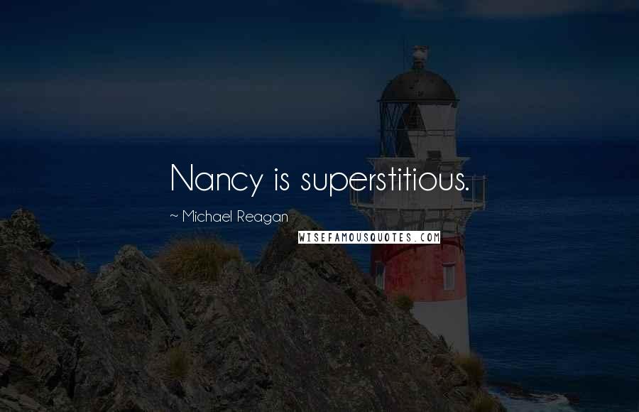 Michael Reagan Quotes: Nancy is superstitious.