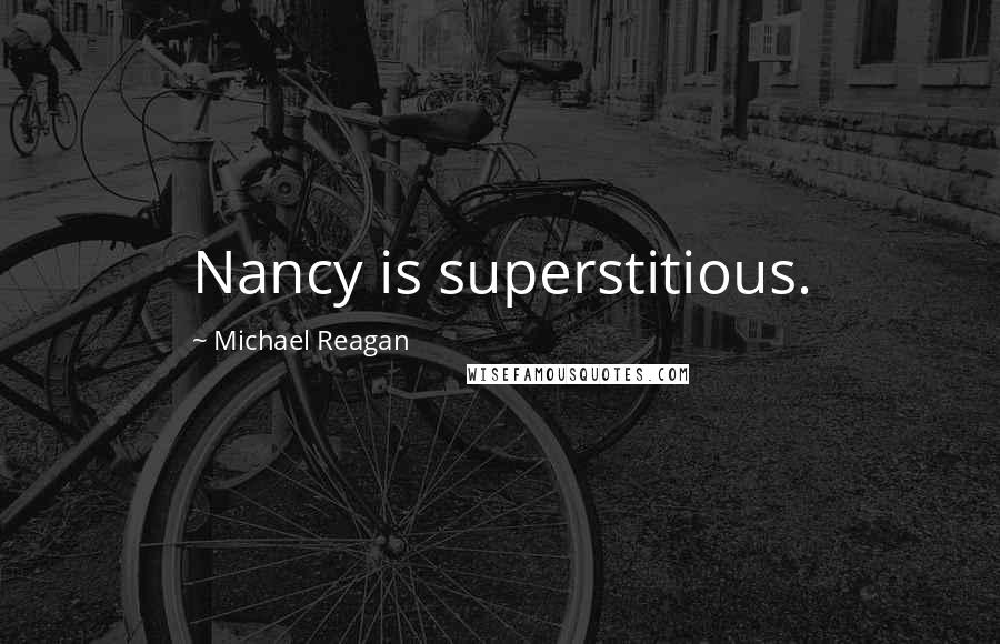 Michael Reagan Quotes: Nancy is superstitious.