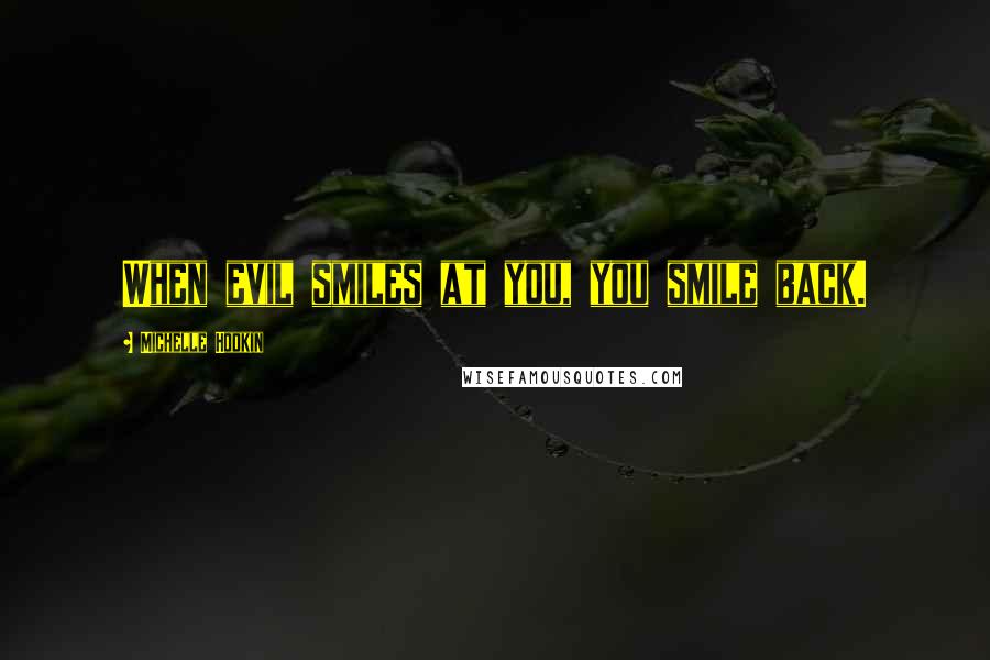 Michelle Hodkin Quotes: When evil smiles at you, you smile back.