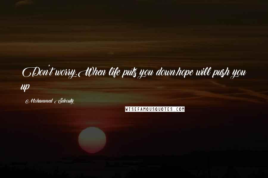 Mohammed Sekouty Quotes: Don't worry.When life puts you down,hope will push you up