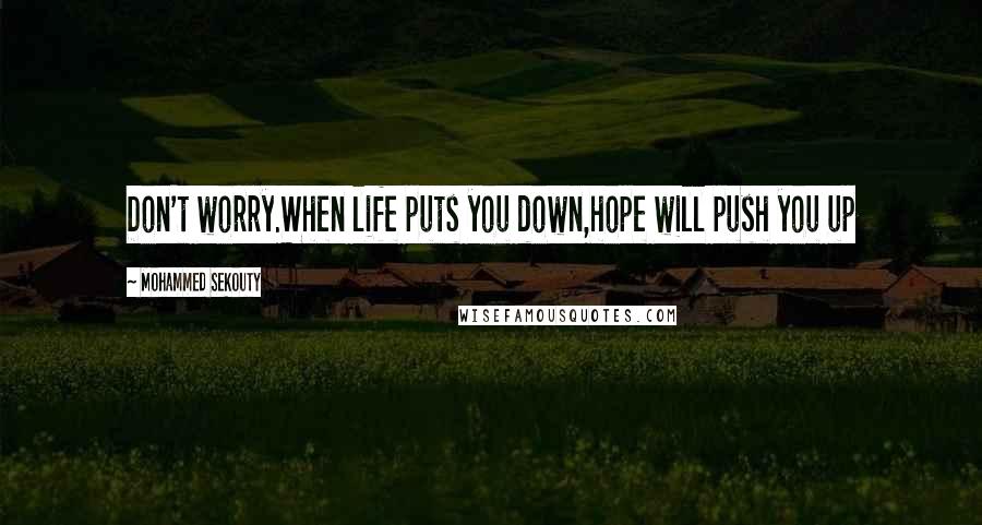 Mohammed Sekouty Quotes: Don't worry.When life puts you down,hope will push you up