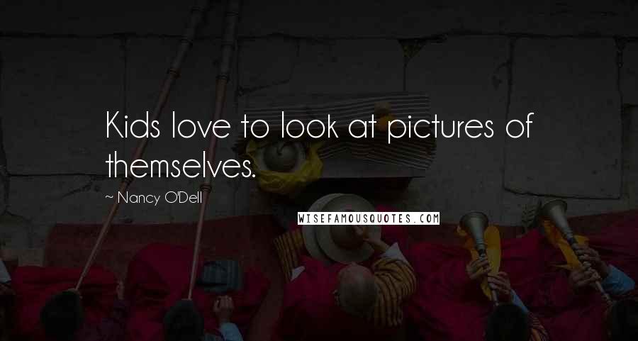 Nancy O'Dell Quotes: Kids love to look at pictures of themselves.