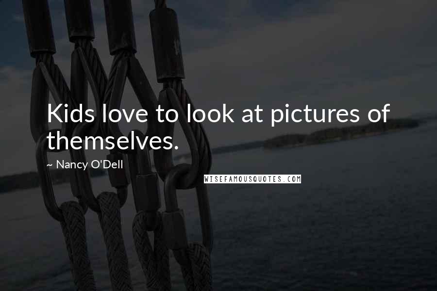 Nancy O'Dell Quotes: Kids love to look at pictures of themselves.