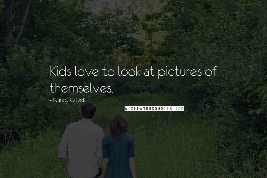Nancy O'Dell Quotes: Kids love to look at pictures of themselves.