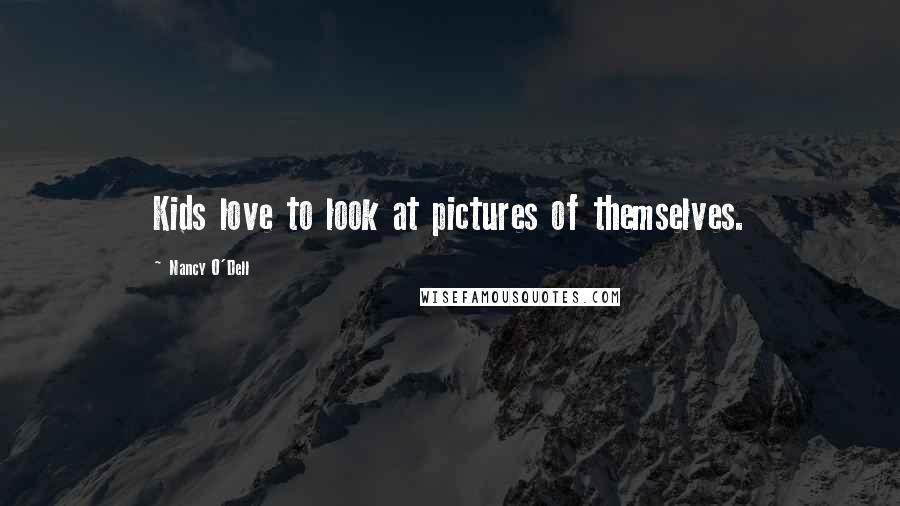 Nancy O'Dell Quotes: Kids love to look at pictures of themselves.