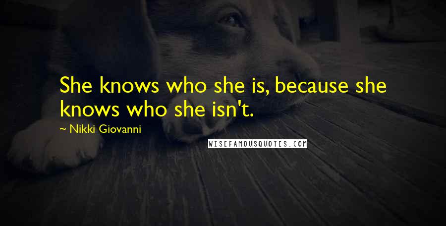 Nikki Giovanni Quotes: She knows who she is, because she knows who she isn't.