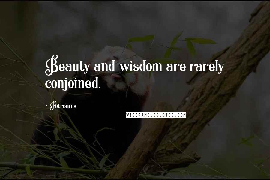 Petronius Quotes: Beauty and wisdom are rarely conjoined.