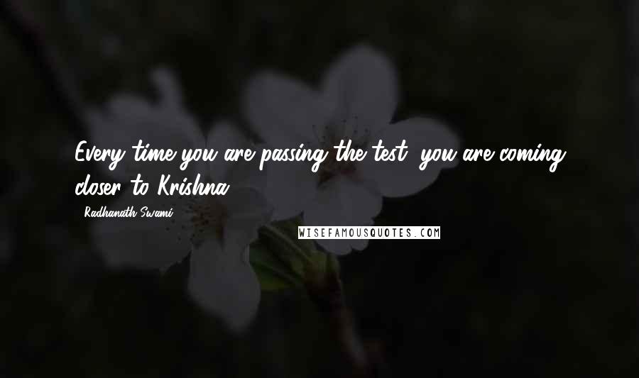 Radhanath Swami Quotes: Every time you are passing the test, you are coming closer to Krishna.