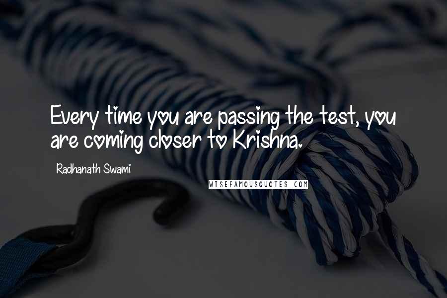 Radhanath Swami Quotes: Every time you are passing the test, you are coming closer to Krishna.