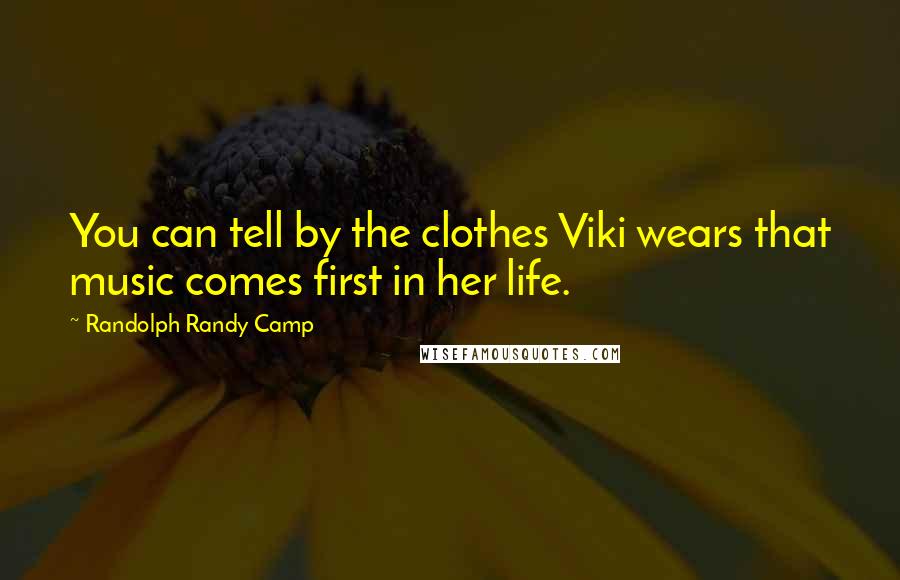 Randolph Randy Camp Quotes: You can tell by the clothes Viki wears that music comes first in her life.